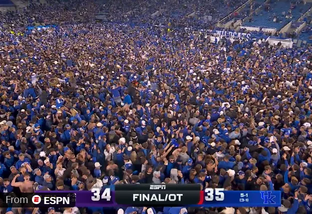 Kentucky fans storm the field after beating LSU